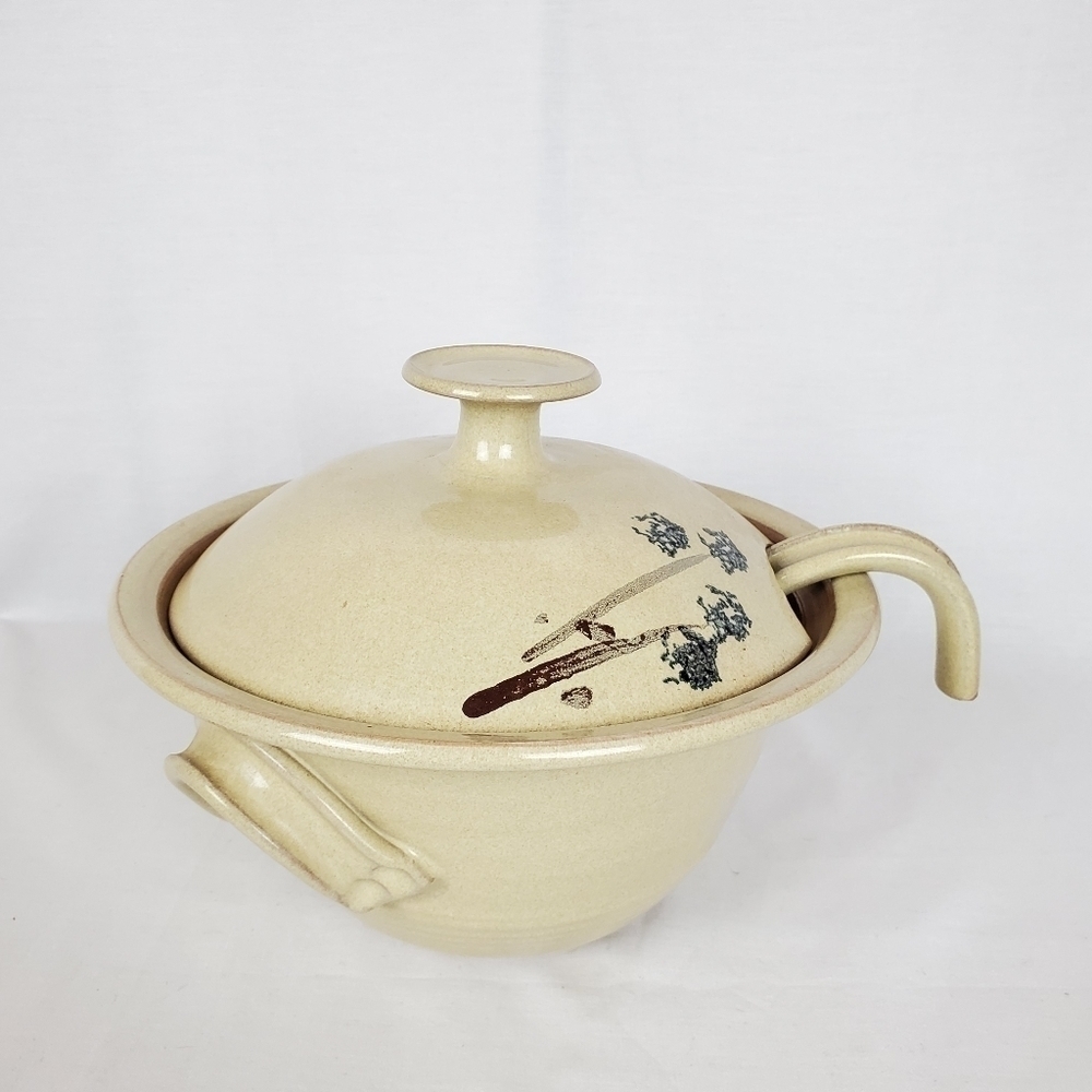 Vintage soup tureen with ladle